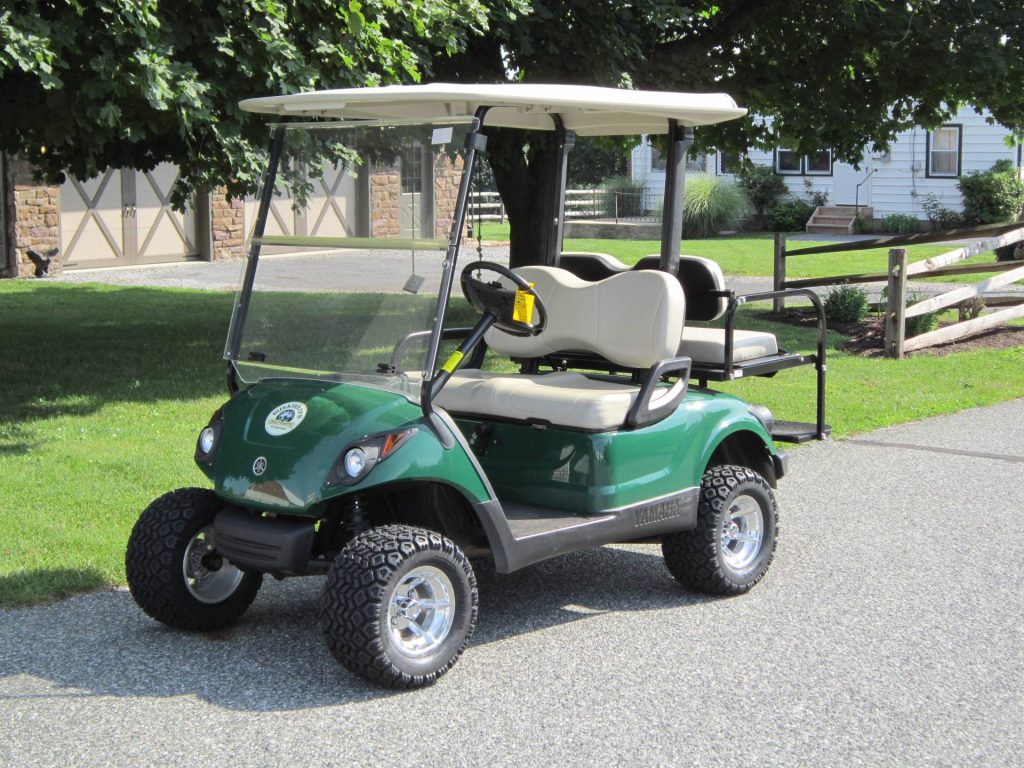 Green golf cart